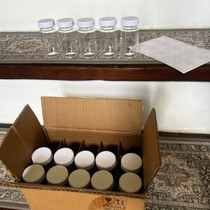 Set of Clear Glass Jars with White Lids and Labels